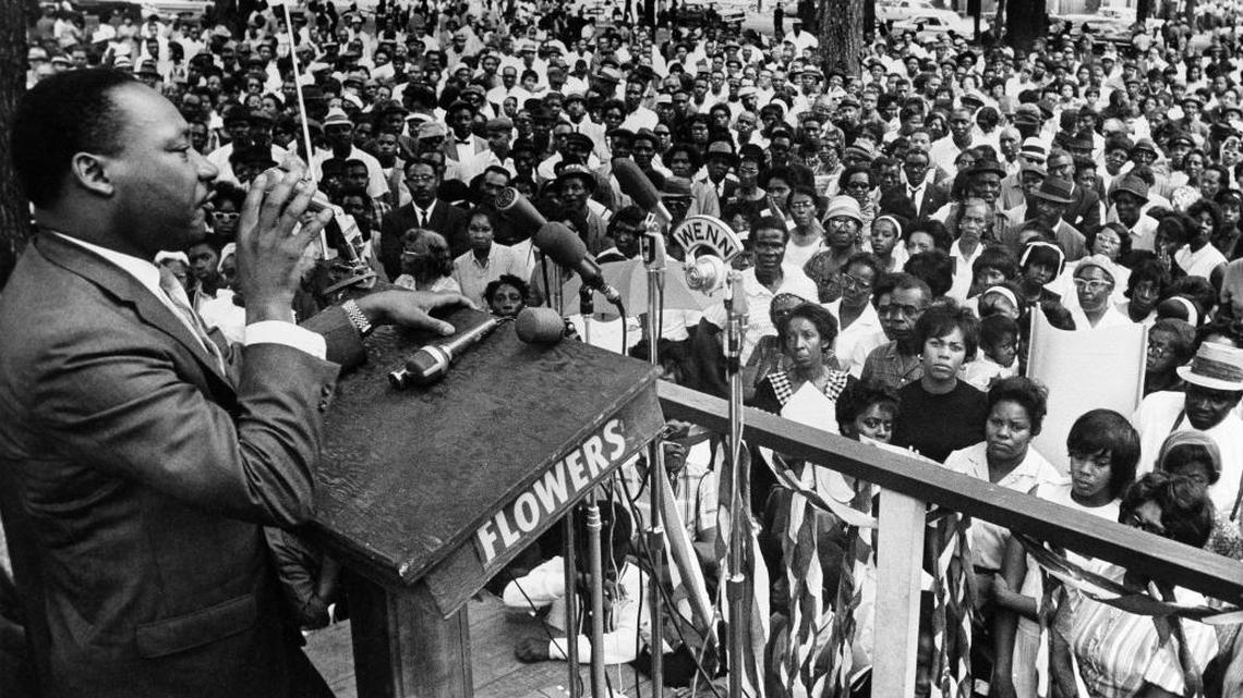 FILE - In this April 30, 1966 photo, The Rev. Martin Luther King Jr. addresses a crowd of some 3,000 persons in Birmingham, Ala., in Kelly Ingram Park on the last day of his three-day whistle-stop tour of Alabama, encouraging black voters to vote as a bloc in the primary election.