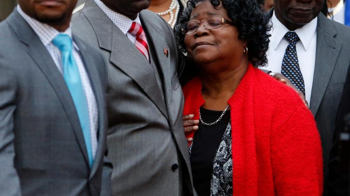 Judy Scott, Walter Scott’s mother, is comforted by her son Rodney Scott after a mistrial was declared in the case of the police officer charged with killing the victim in North Charleston, S.C.