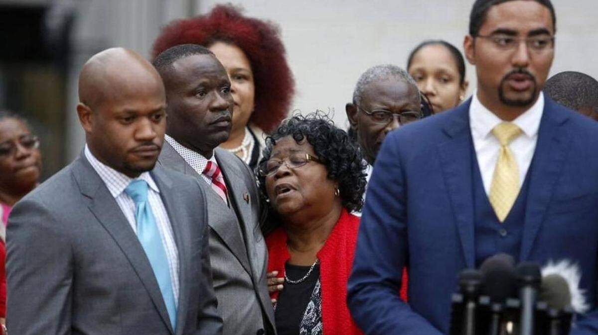 Judy Scott, mother of Walter Scott, who was unarmed and shot to death while running from a white police officer in Charleston, South Carolina, seems overcome after a judge declared a mistrial in the officer’s trial.