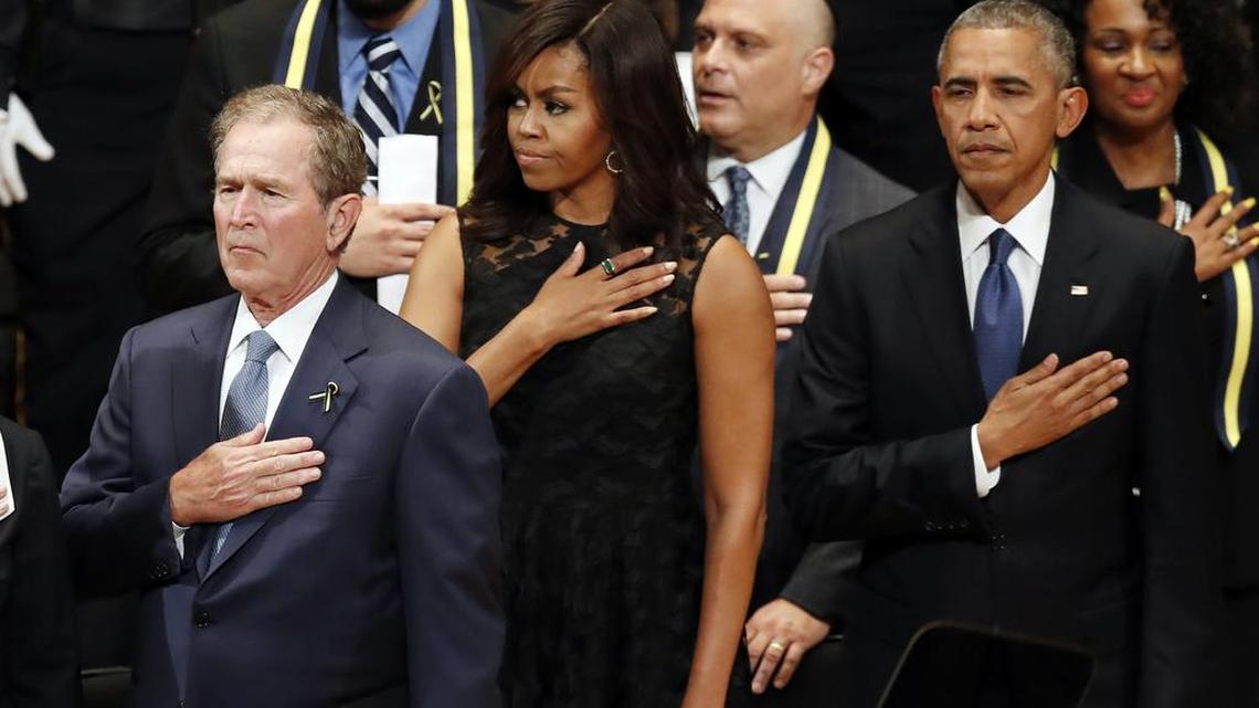 Among the speakers at a service for the fallen officers in Dallas were former president George W. Bush and President Barack Obama.
