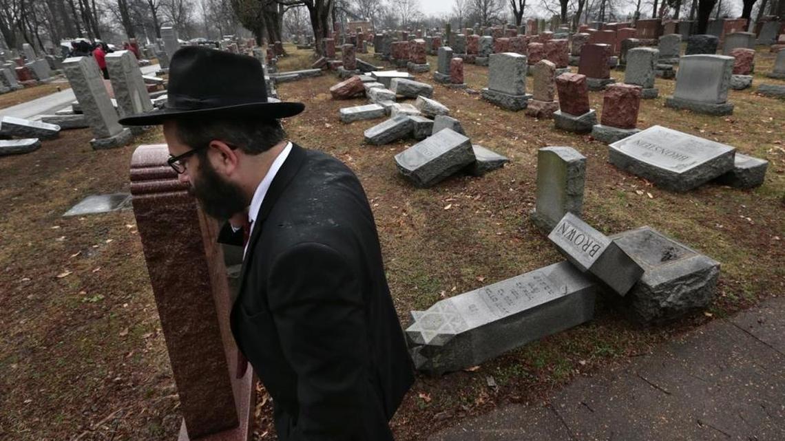 Rabbi Hershey Novack walks through Chesed Shel Emeth Cemetery in University City, Missouri where almost 200 gravestones were vandalized.