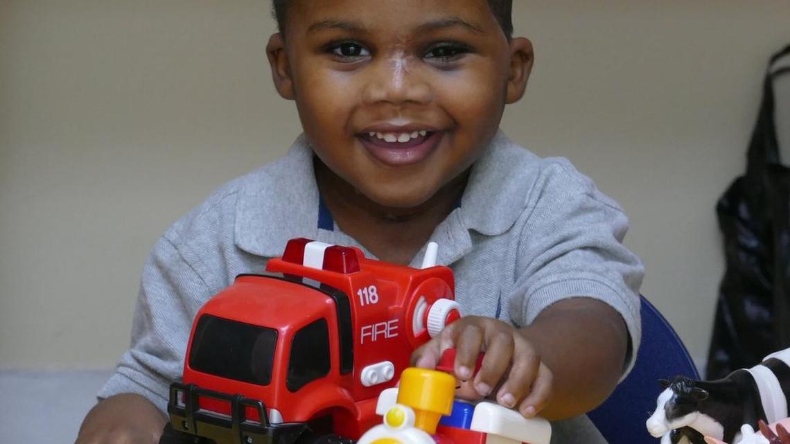 Darnal Mundy, 3, almost three months after finding his a firearm in his home and shooting himself in the head, is recovering at Jackson Rehabilitation Hospital.