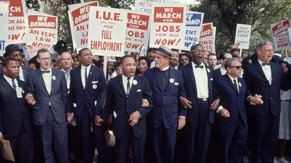 In 1963, Dr. Martin Luther King Jr., center, and other leaders were on the front lines of the March on Washington for Jobs & Freedom.