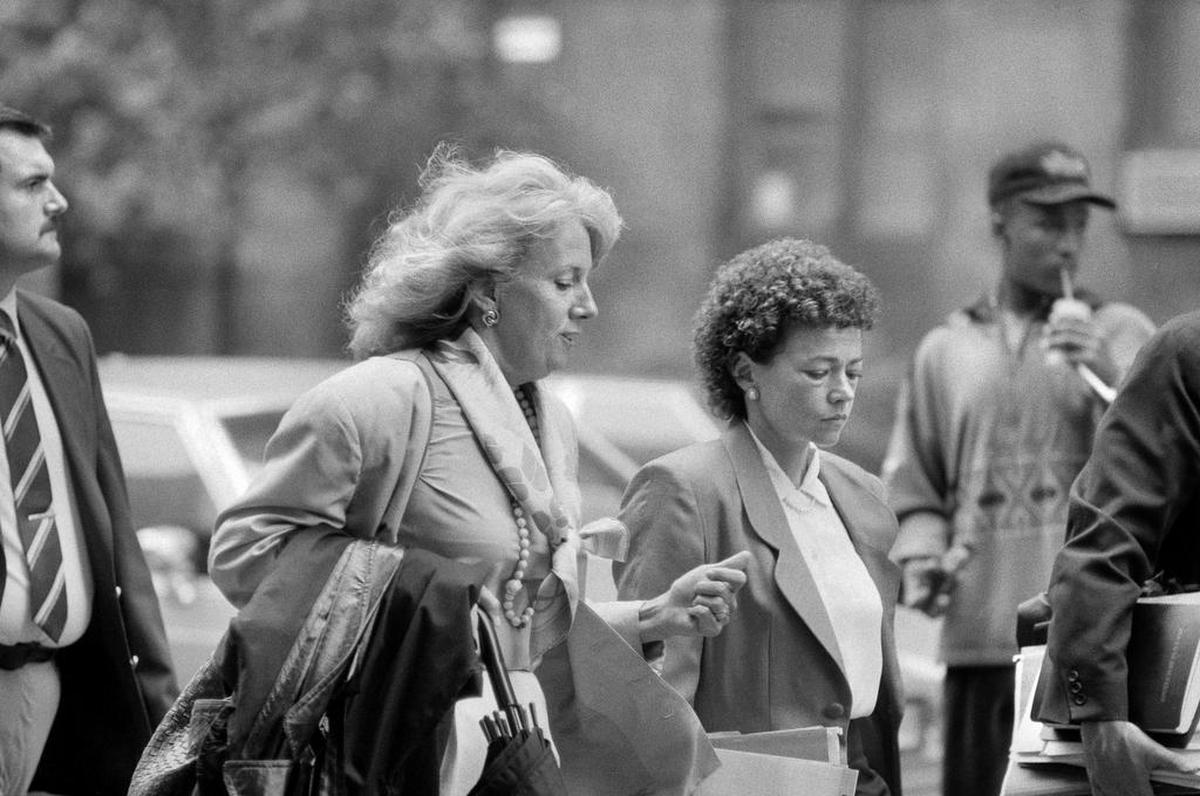 FILE — Linda Fairstein, chief of the Manhattan district attorney’s sex crimes unit, left, enters court with Elizabeth Lederer, the prosecutor who handled the Central Park jogger case, in August 1990. “When They See Us,” Ava DuVernay’s Netflix series about the Central Park jogger case, has undercut the public perception of Feinstein as a law enforcement hero. (Chester Higgins, Jr./The New York Times)
