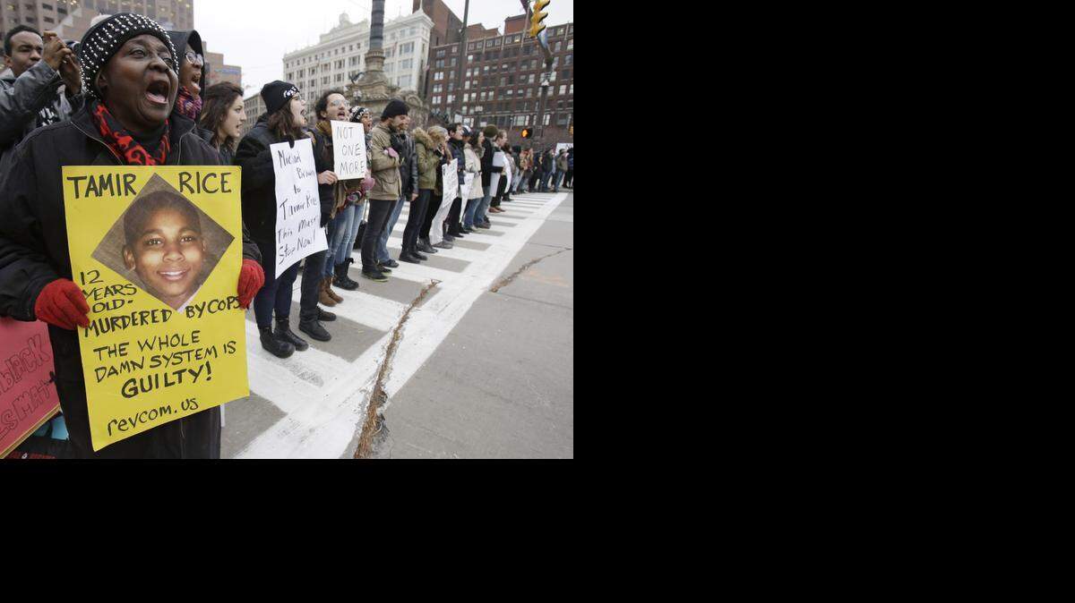 
SHOOTING PROTEST: Demonstrators block a public square in Cleveland to protest the fatal police shooting of 12-year-old Tamir Rice. 
