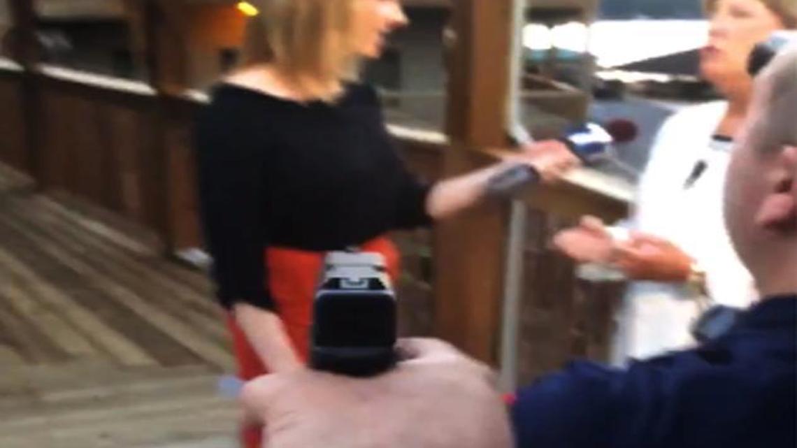 
In this framegrab from video posted on Bryce Williams’ Twitter account and Facebook page, Williams, whose real name is Vester Lee Flanagan II, aims a gun over the shoulder of WDBJ-TV cameraman Adam Ward at reporter Alison Parker as she conducts a live on-air interview Wednesday, Aug. 26, 2015. Moments later, Flanagan fatally shot Parker and Ward and injured Vicki Gardner, who was being interviewed. The station said Flanagan was also an employee at WDBJ and appeared on air as Bryce Williams. 
