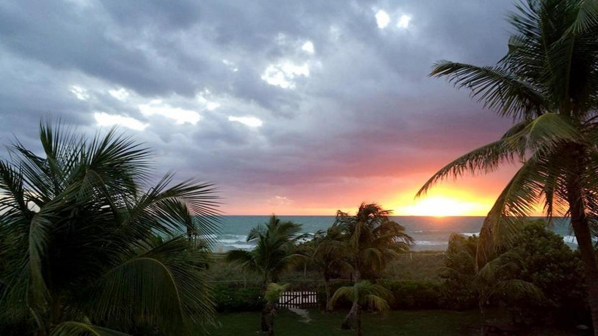 Sunrise in Surfside. Stringent and intelligent building codes limit Surfside building heights to no more than 12 stories, providing beachgoers with plenty of sunlight throughout the daytime hours.