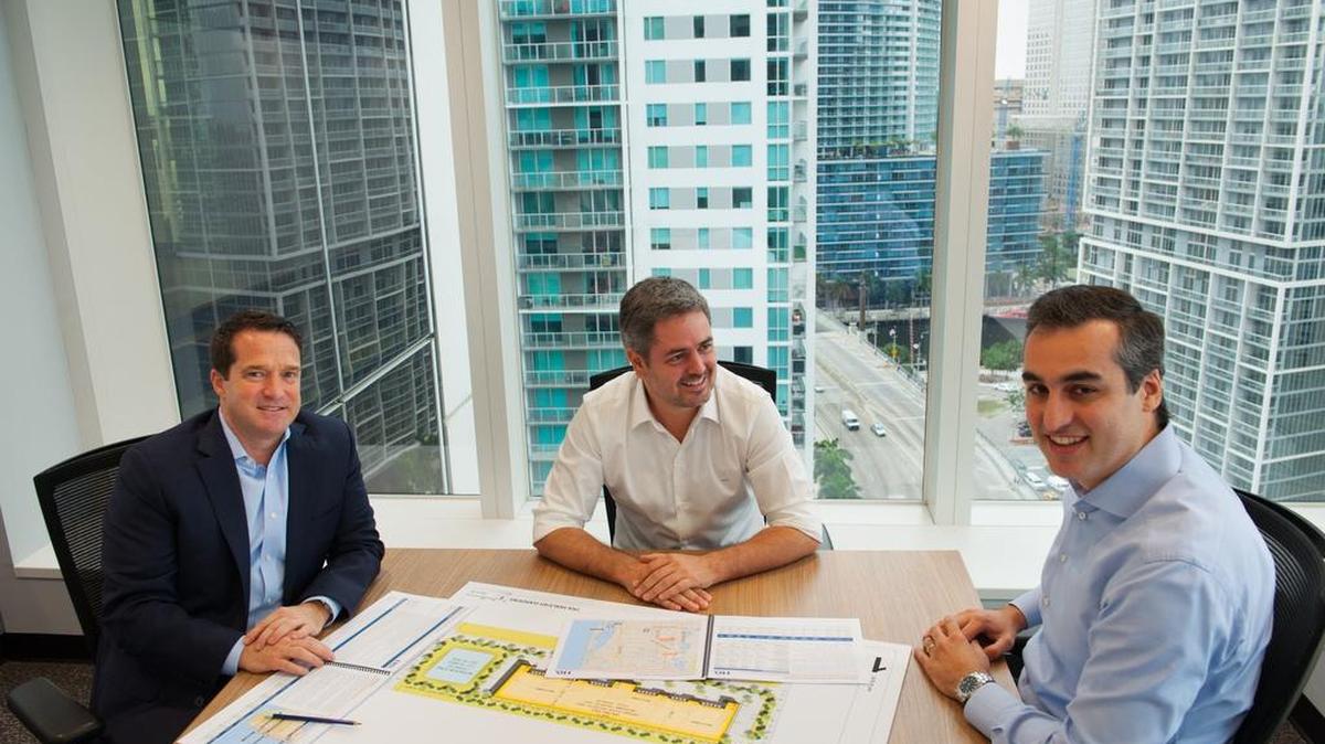 From left: Scott F. Pryce, founder and CEO of TRX Investments; Luiz Augusto Faria do Amaral, co-founder and CEO of TRX Group; and Fernando Fiuza de Souza, managing director of TRX Investments and founder and managing partner of TRX Residential. They are at TRX Group’s headquarters at 600 Brickell Ave., Miami.