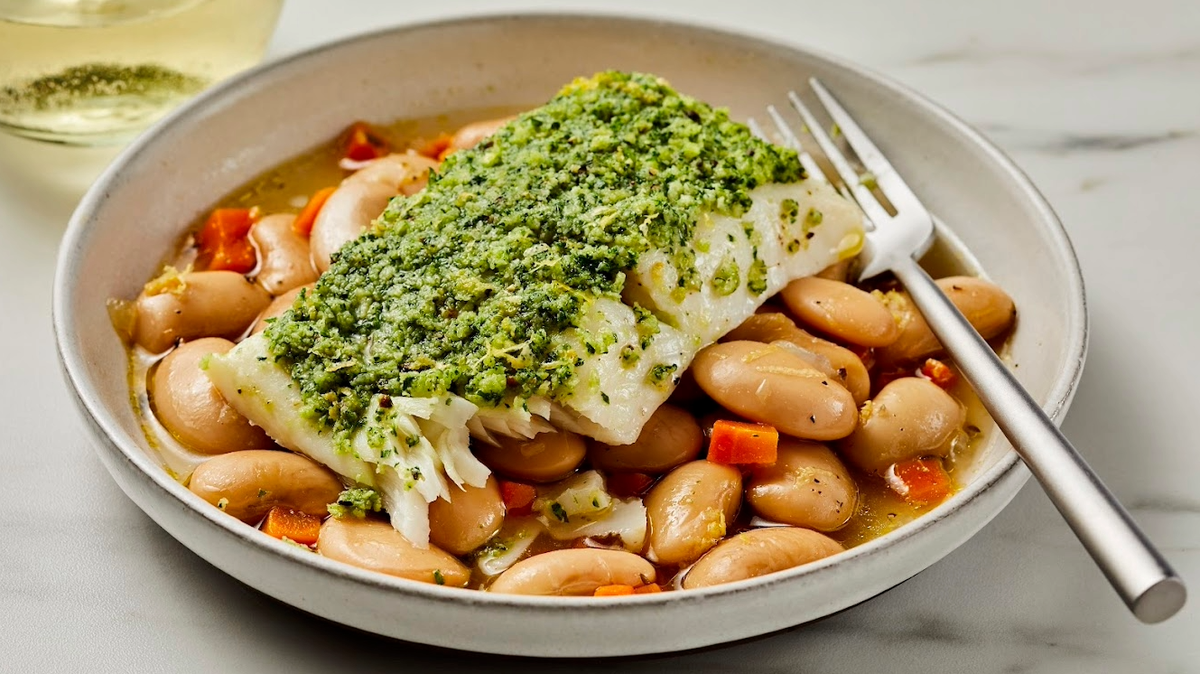 Herb Crusted Alaska Halibut with Cassoulet of White Beans delivers restaurant-quality presentation while remaining simple enough for home cooks to prepare. 