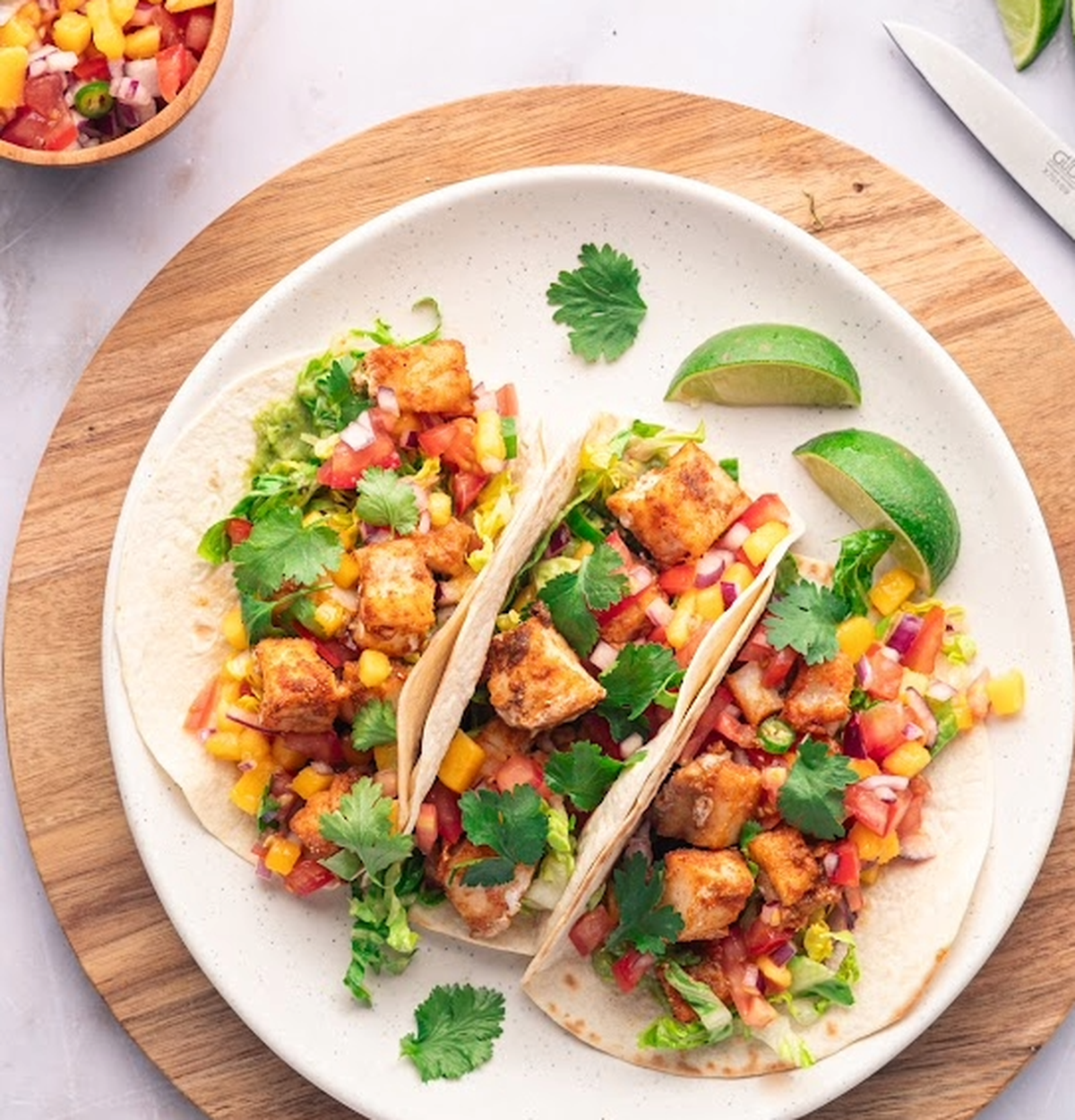 Wild Alaska cod can take center stage in tacos layered with bold flavors.