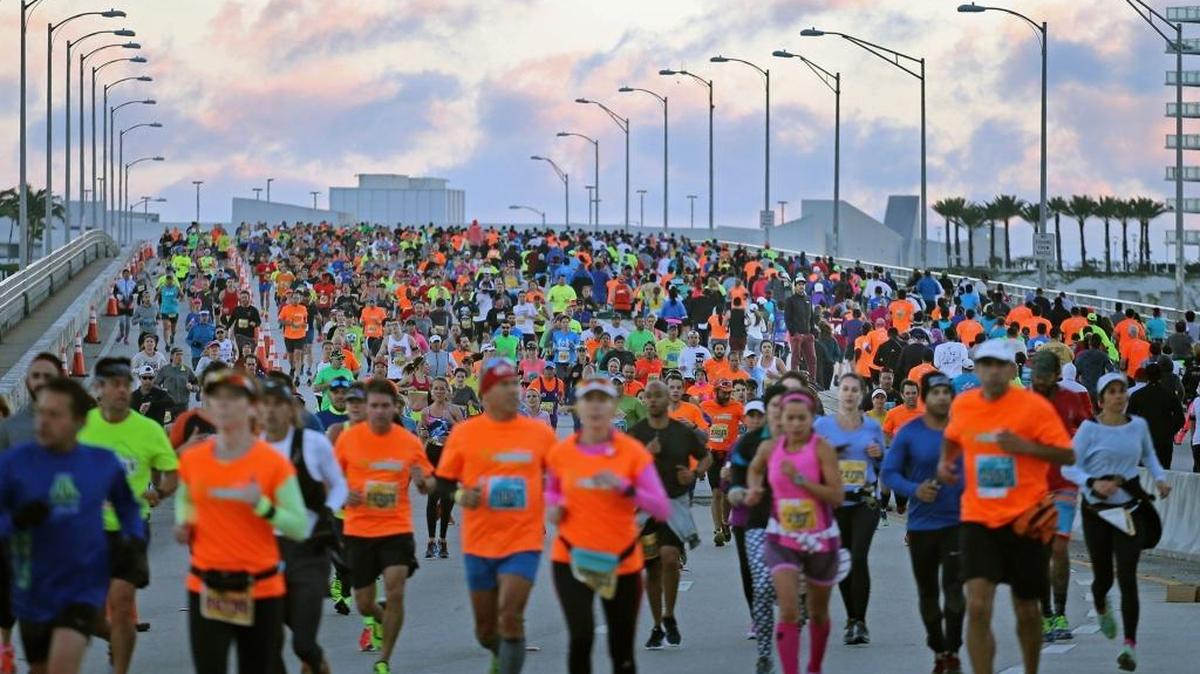 Organizers have moved the annual marathon health and fitness expo to Marlins Park in 2017. Here, runners take over the MacArthur Causeway in both directions as they participate in the Miami Marathon on January 24, 2016.