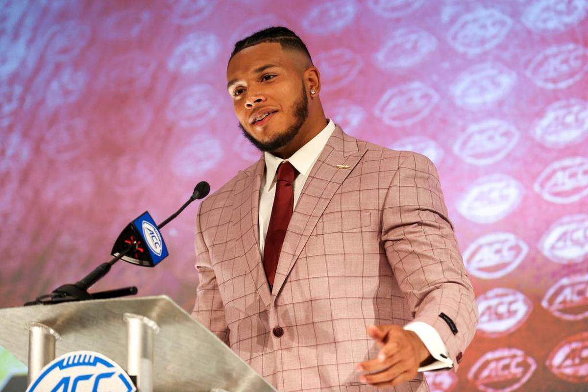 Florida State defensive end Jermaine Johnson II answers a question during an NCAA college football news conference at the Atlantic Coast Conference media days in Charlotte, N.C., Thursday, July 22, 2021.
