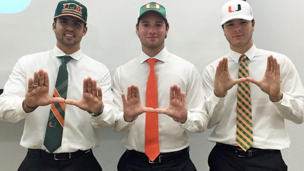 Among the Miami Hurricanes freshmen who could make an immediate impact this season are power-hitting first baseman Alejandro Toral, left, who is seen here on signing day along with Daniel Federman, center, and Joe Perez.