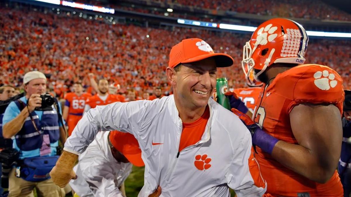 Clemson head coach Dabo Swinney celebrates after the Tigers’ 23-17 win against Florida State on Saturday, Nov. 7, 2015, in Clemson, S.C.
