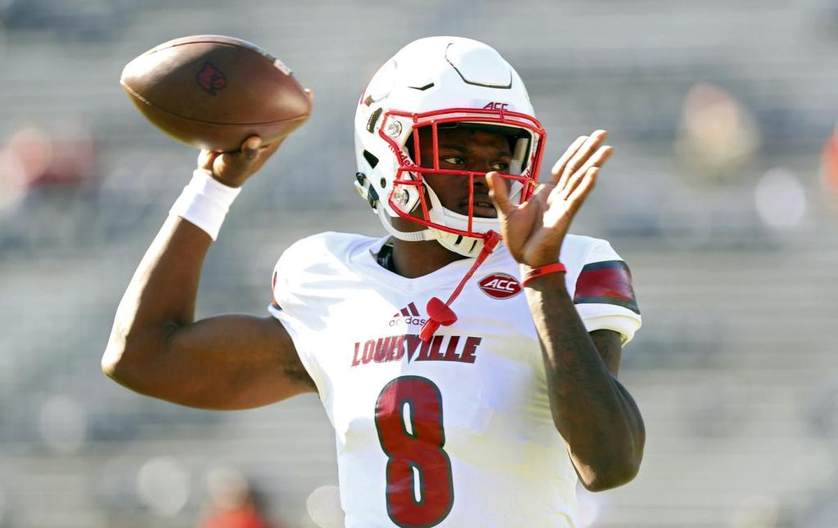 Louisville quarterback Lamar Jackson (8) throws a pass during warmups before a 2016 NCAA game against Virginia in Charlottesville.