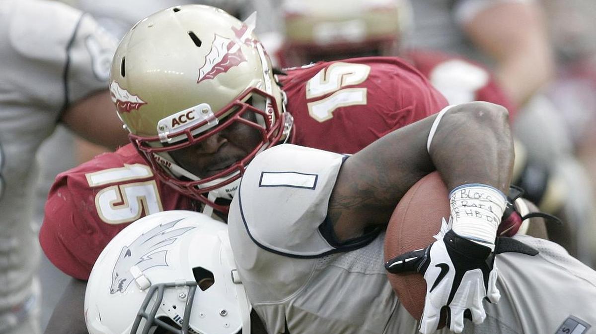 
Florida State's Mario Edwards (15) tackles Nevada's Brandon Wimberly during a game Sept. 14, 2013 in Tallahassee. 
