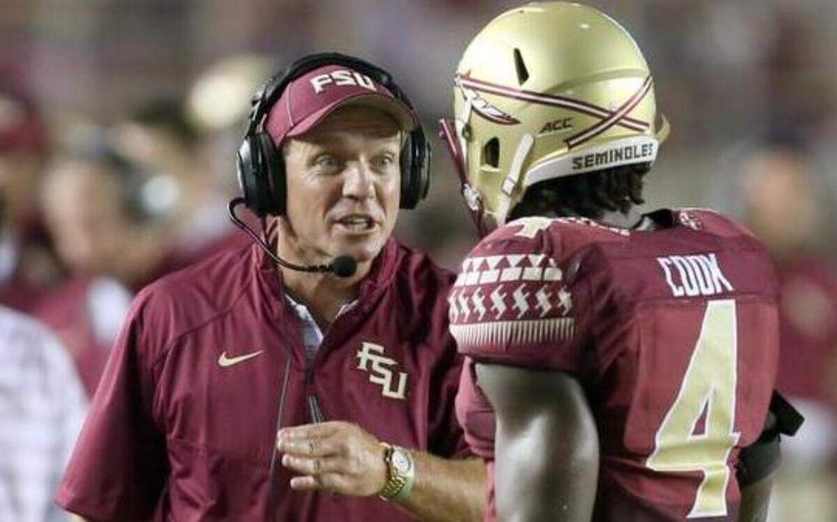 
FSU head coach Jimbo Fisher congratulates running back Dalvin Cook after he scored a touchdown against The Citadel at Doak Campbell Stadium in Tallahassee, Fla., on Saturday, Sept. 6, 2014. 
