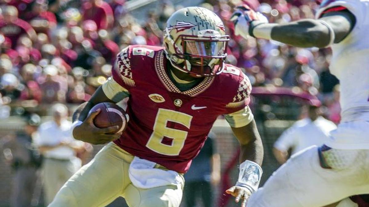 
Florida State quarterback Everett Golson (6) scrambles in the second half of an NCAA college football game against Louisville in Tallahassee, Fla., Saturday, Oct. 17, 2015. Florida State defeated Louisville 41-21. 
