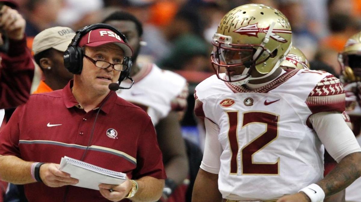 Florida State head coach Jimbo Fisher, left, talks with Deondre Francois, right, in the third quarter of an NCAA college football game against Syracuse in Syracuse, N.Y., Sat., Nov. 19, 2016.