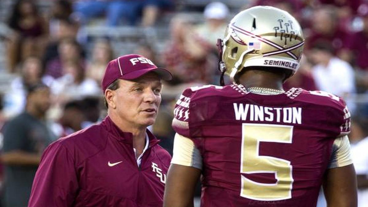 
Florida State coach Jimbo Fisher (L) talks with Heisman quarterback Jameis Winston during warm ups before FSU's NCAA college football game against Clemson in Tallahassee, Fla., Saturday, Sept. 20, 2014.
