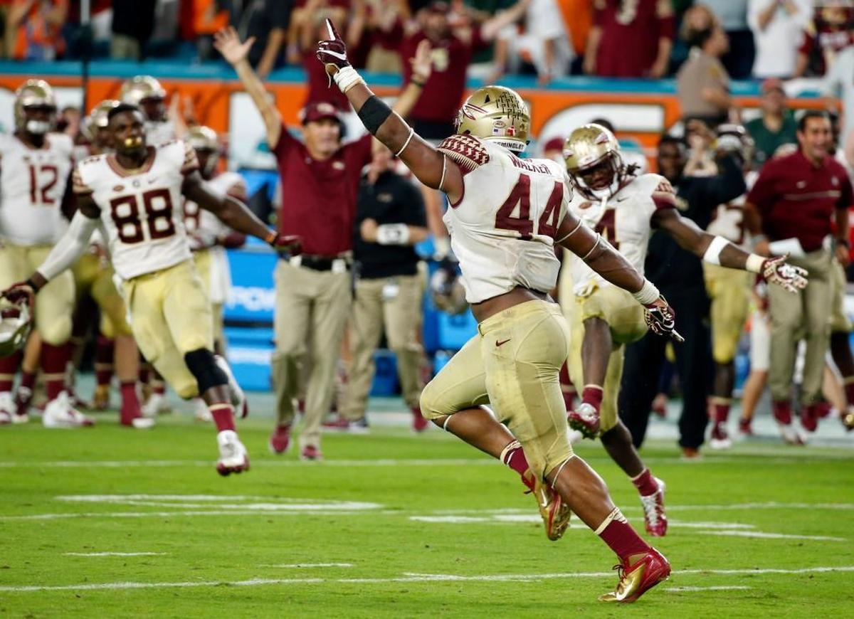 Florida State defensive end DeMarcus Walker celebrates after blocking a PAT in the final minutes of FSU’s eventual victory over the Hurricanes at Hard Rock Stadium on Oct. 8, 2016.