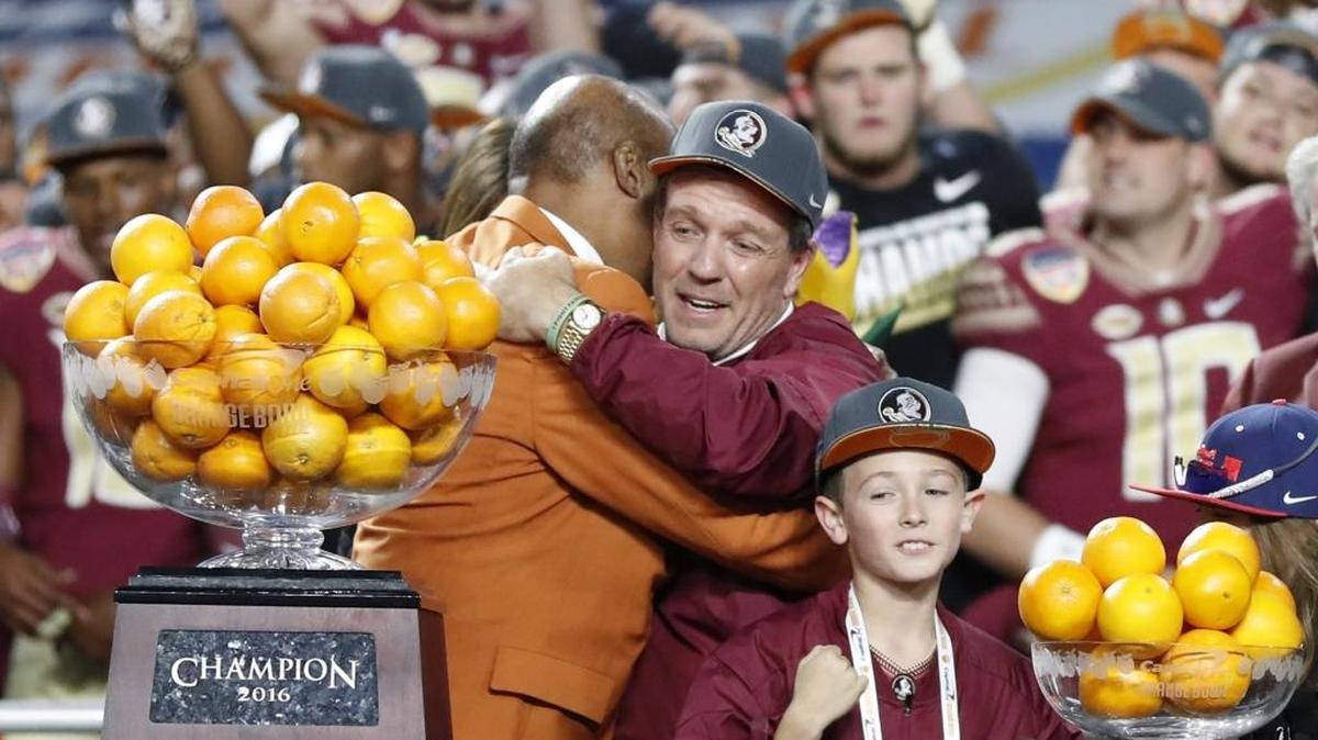 Florida State coach Jimbo Fisher with the Orange Bowl trophy after the Seminoles beat Michigan on December 31, 2016.