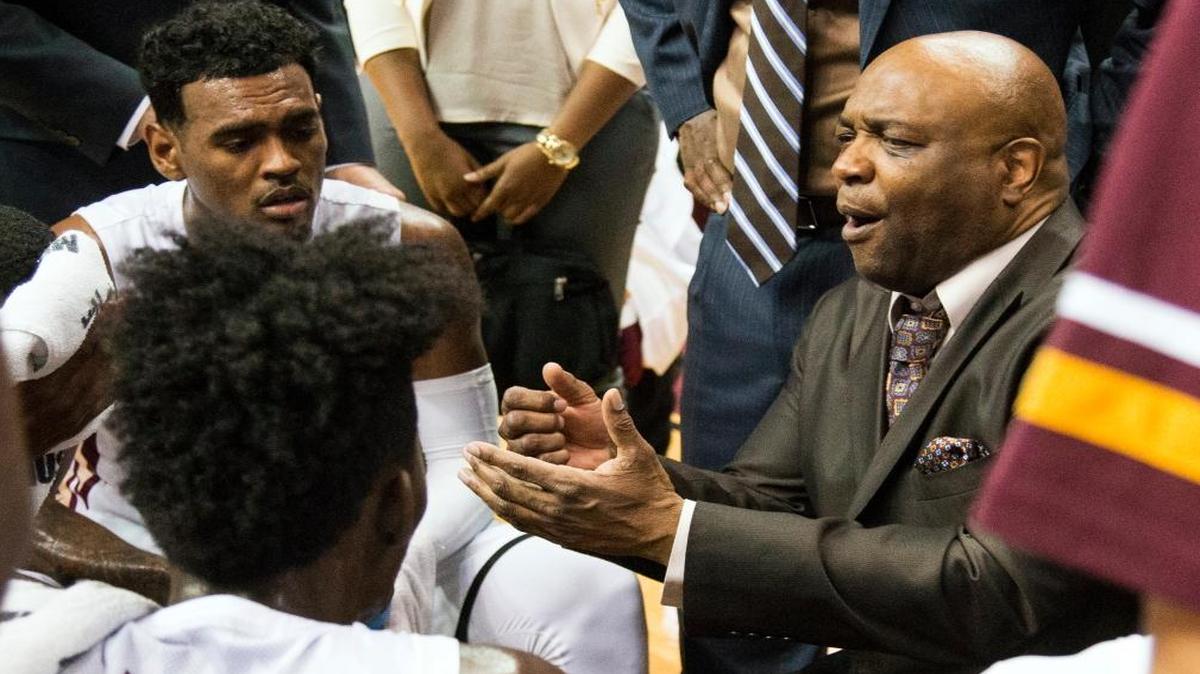 Florida State head coach Leonard Hamilton, right, talks to his team during a timeout in the first half of an NCAA college basketball game against Louisville in Tallahassee, Fla. Hamilton seems to have Florida State finally heading in the right direction again. The Seminoles are back in the NCAA Tournament after a five-year absence.