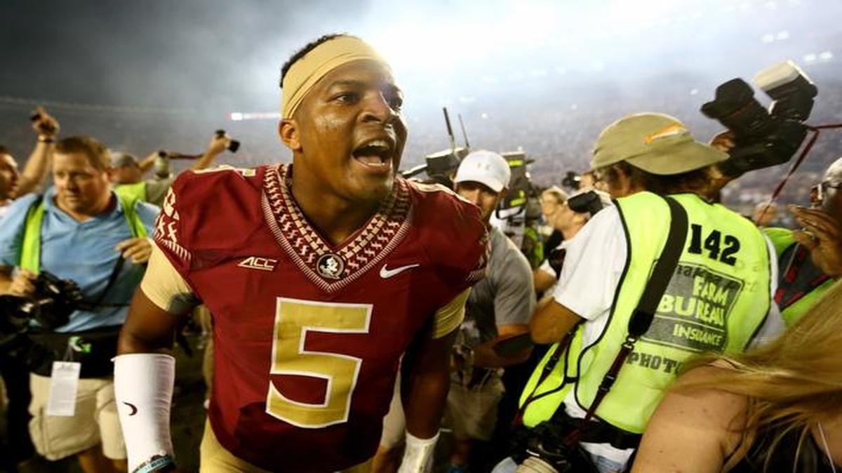 
Jameis Winston #5 of the Florida State Seminoles celebrates after defeating the Notre Dame Fighting Irish 31-27 at Doak Campbell Stadium on October 18, 2014 in Tallahassee, Florida. 
