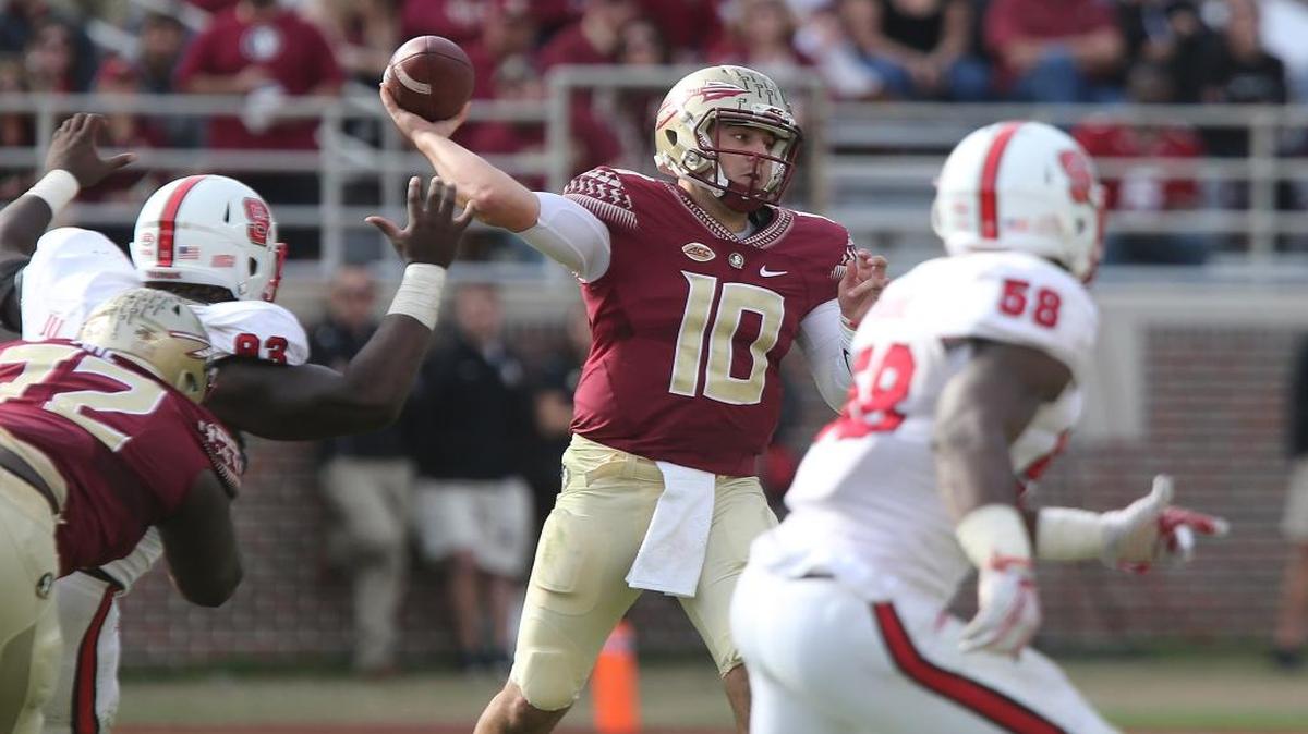 Florida State's Sean Maguire (10) attempts a pass against the North Carolina State defense in the second quarter of an NCAA college football game, Saturday, Nov. 14, 2015, in Tallahassee, Fla.