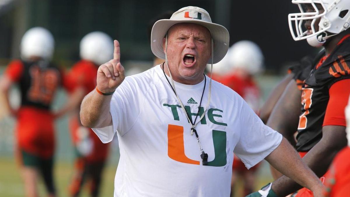 Offensive line coach Art Kehoe yells instructions during Day 2 of UM Fall Camp at the Greentree Field on Friday, Aug. 7, 2015.