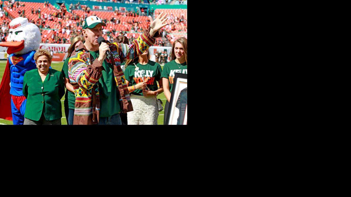 
Former Miami Hurricanes quarterback Jim Kelly is honored at halftime as the Canes play the North Carolina Tar Heels at Sun Life Stadium in Miami Gardens, Florida, Novemebr 1, 2014.

