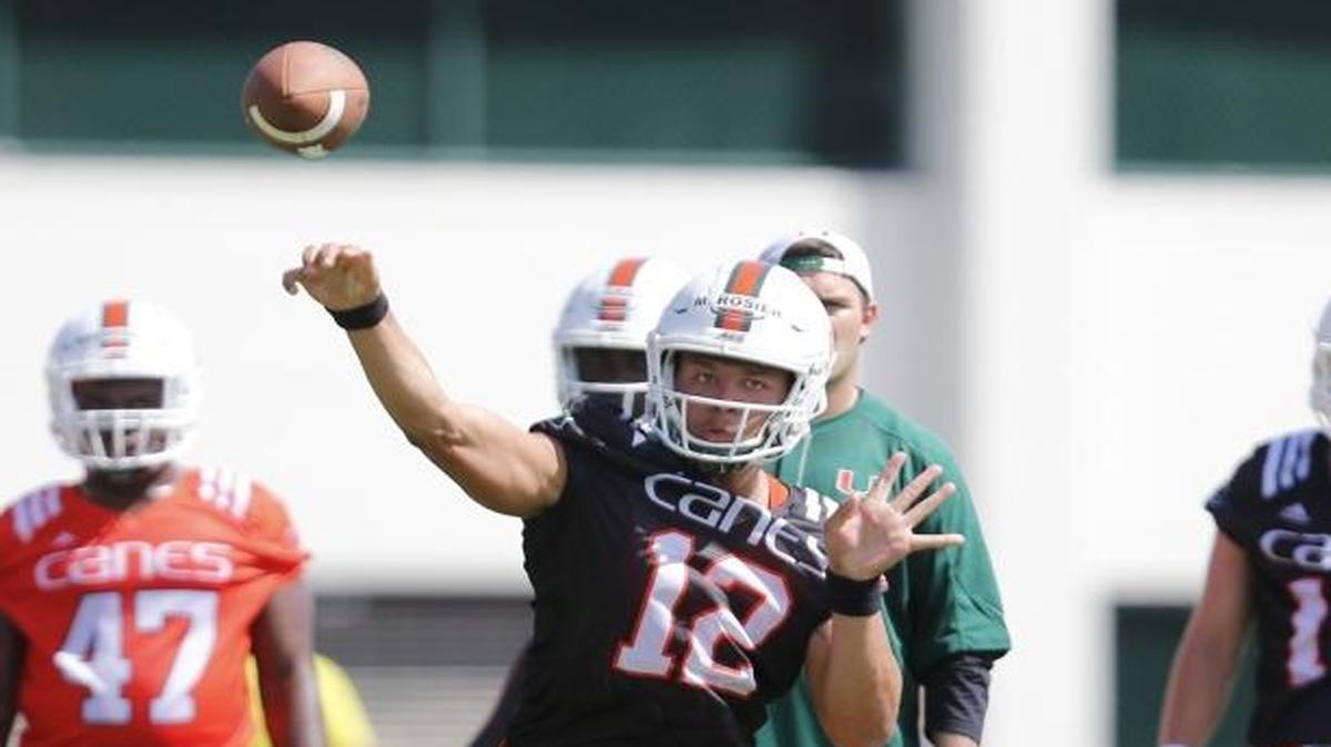 Miami Hurricanes quarterback Malik Rosier throws during opening day of Miami Hurricanes football practice in Coral Gables on Thurs., Aug. 4, 2016.