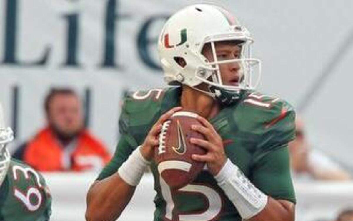 
University of Miami's quarterback Brad Kaaya drops back in the second quarter as they play Arkansas State at Sun Life Stadium in Miami Gardens, Florida, Sept. 13, 2014.
