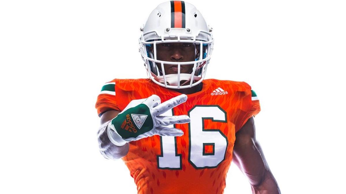 The University of Miami unveils its new home jersey from Adidas on Monday.