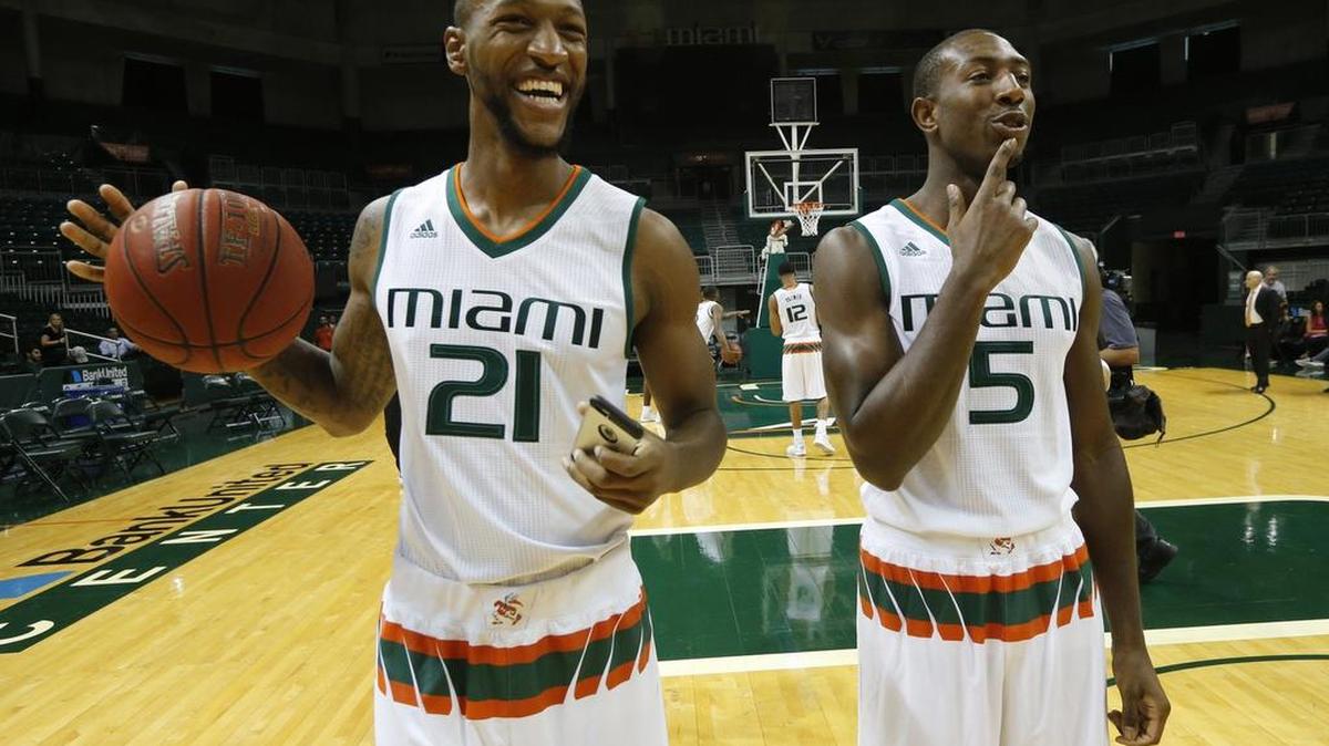 (From left) Kamari Murphy, Davon Reed and the Miami Hurricanes easily defeated Dowling (N.Y.) 91-40 in an exhibition game at BankUnited Center on Wednesday, Nov. 4, 2015.