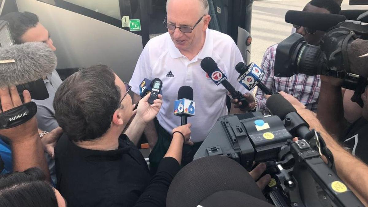 University of Miami basketball coach Jim Larranaga answers questions from the media before heading to the airport with his team, bound for their NCAA Tournament opener in Tulsa, Okla.