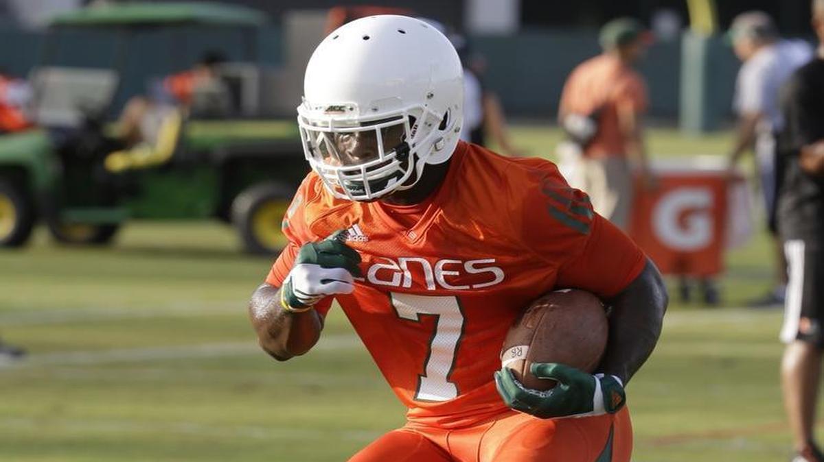 
Miami running back Gus Edwards runs drills during NCAA college football practice, Thursday, Aug. 6, 2015, in Coral Gables, Fla. 
