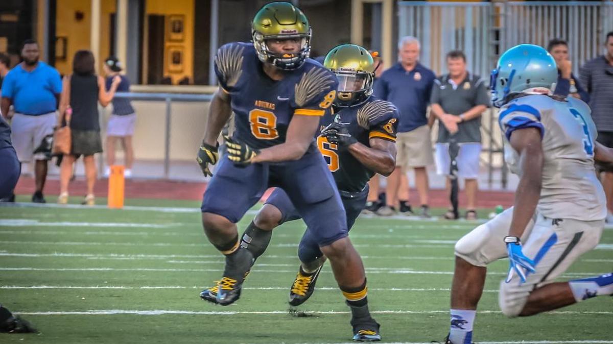 University of Miami commits Michael Irvin II (8) and Sam Bruce (6) playing for St. Thomas Aquinas.