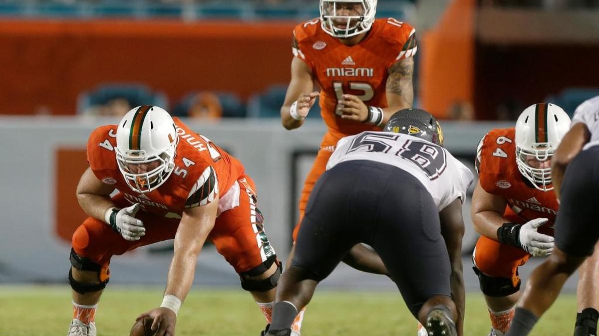 
UM center Hunter Knighton and quarterback Malik Rosier made their collegiate debuts against Bethune-Cookman on Saturday, Sept. 5, 2015 at Sun Life Stadium.
