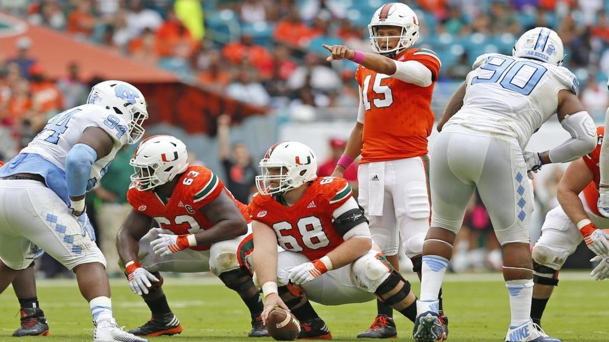 Miami Hurricanes quarterback Brad Kaaya (15) gestures at the line of scrimmage in the first quarter as the University of Miami Hurricanes host the University of North Carolina Tar Heels at Hard Rock Stadium on Sat., Oct. 15, 2016.