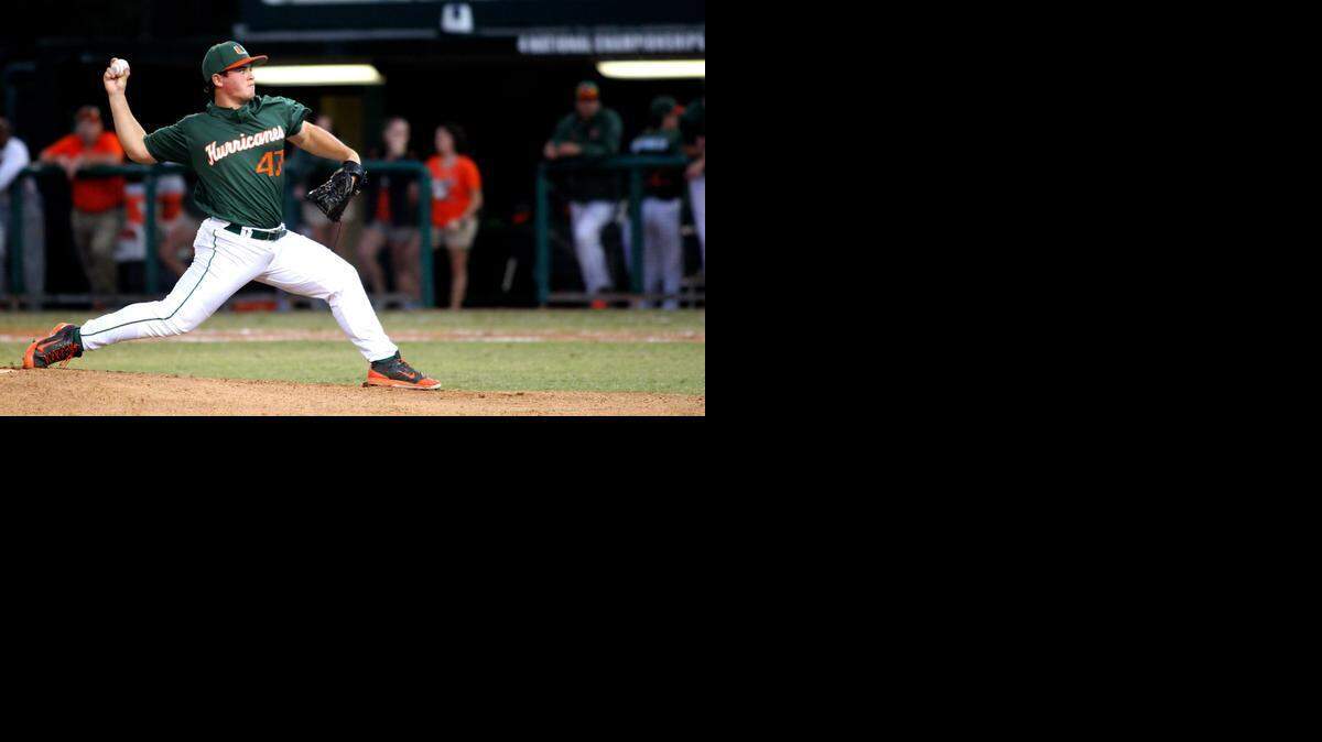 
Pitcher Enrique Sosa throws a pitch at UM's iannual Fan Fest and Alumni Game.
