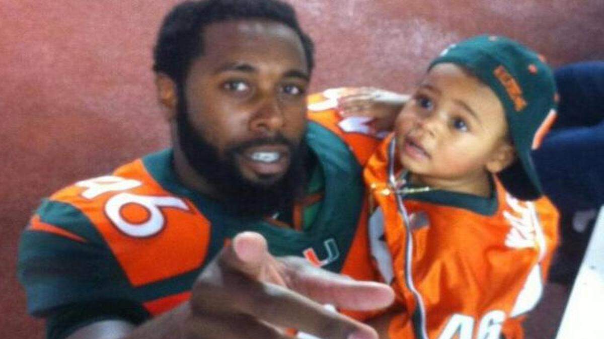 
UM tight end Clive Walford with 1-year-old son Clive III.

