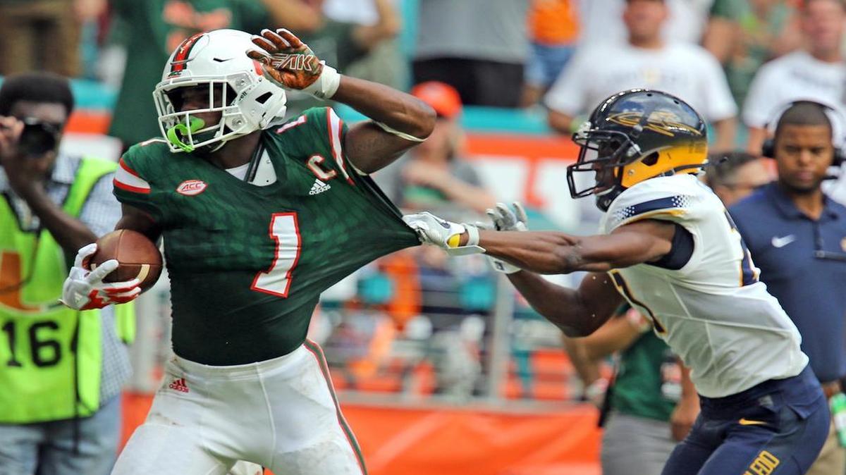 Miami Hurricanes running back Mark Walton rushed for 204 yards and a touchdown against the Toledo Rockets on Saturday, Sept. 23, 2017.