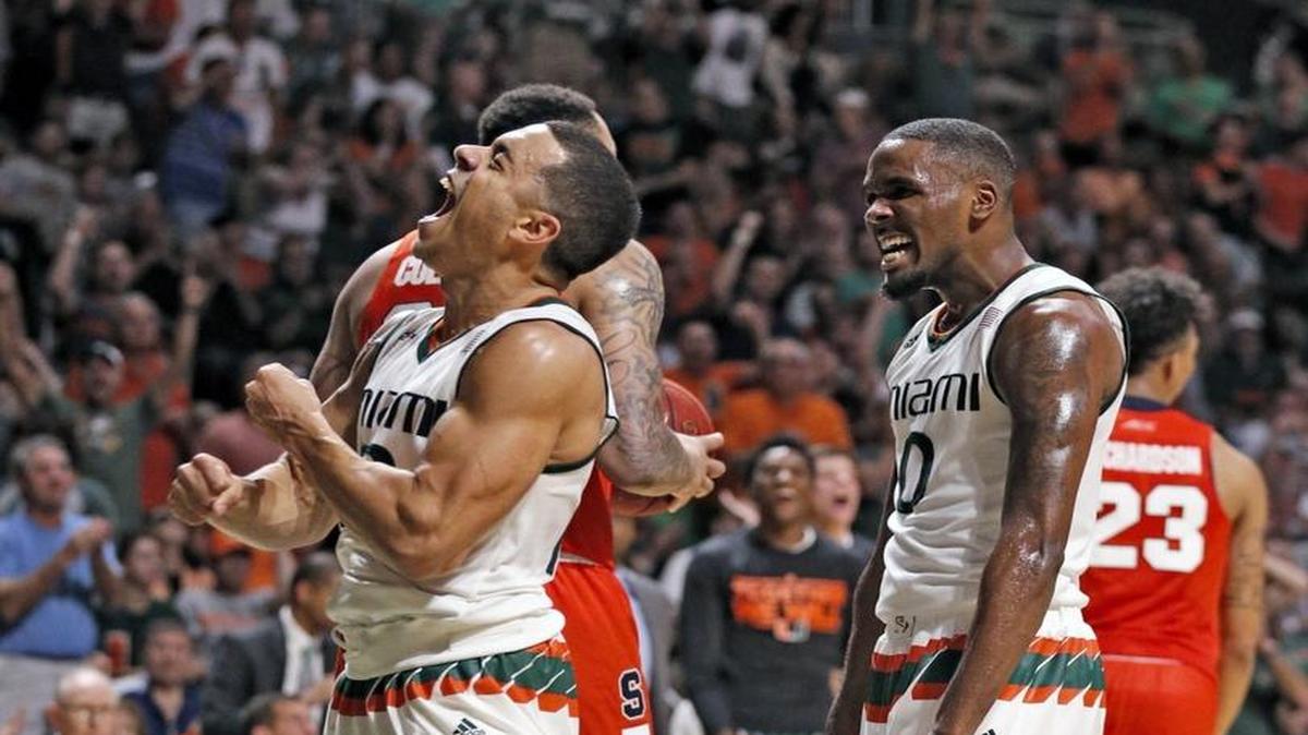 Miami Hurricanes guard Angel Rodriguez (13) and guard Sheldon McClellan (10) celebrate after Rodriguez scores in the second half. Miami defeated Syracuse 64-51 during men's basketball game at BankUnited Center on Saturday, January 2, 2016.