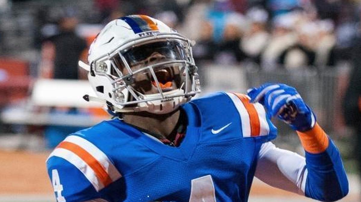 In this Nov. 26, 2016 photo, East St. Louis's Jeff Thomas reacts after his touchdown reception during the Illinois Class 7A high school championship football game against Plainfield North at Memorial Stadium in Champaign, Ill. Thomas is one of UM’s top new faces.