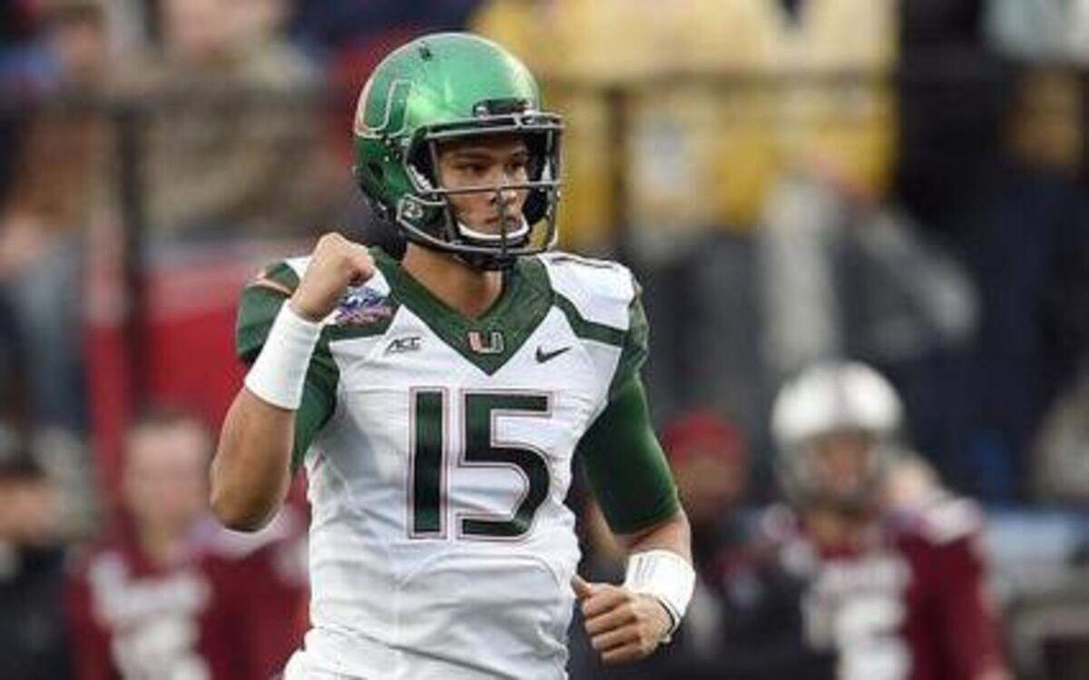 
Brad Kaaya (15) of the Miami Hurricanes reacts to a long gain against the South Carolina Gamecocks during the first quarter of the Duck Commander Independence Bowl at Independence Stadium on Dec. 27, 2014, in Shreveport, Louisiana.
