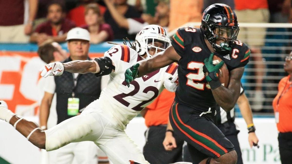 Miami Hurricanes tight end Christopher Herndon IV scores against Virginia Tech at Hard Rock Stadium on Saturday, November 4, 2017.