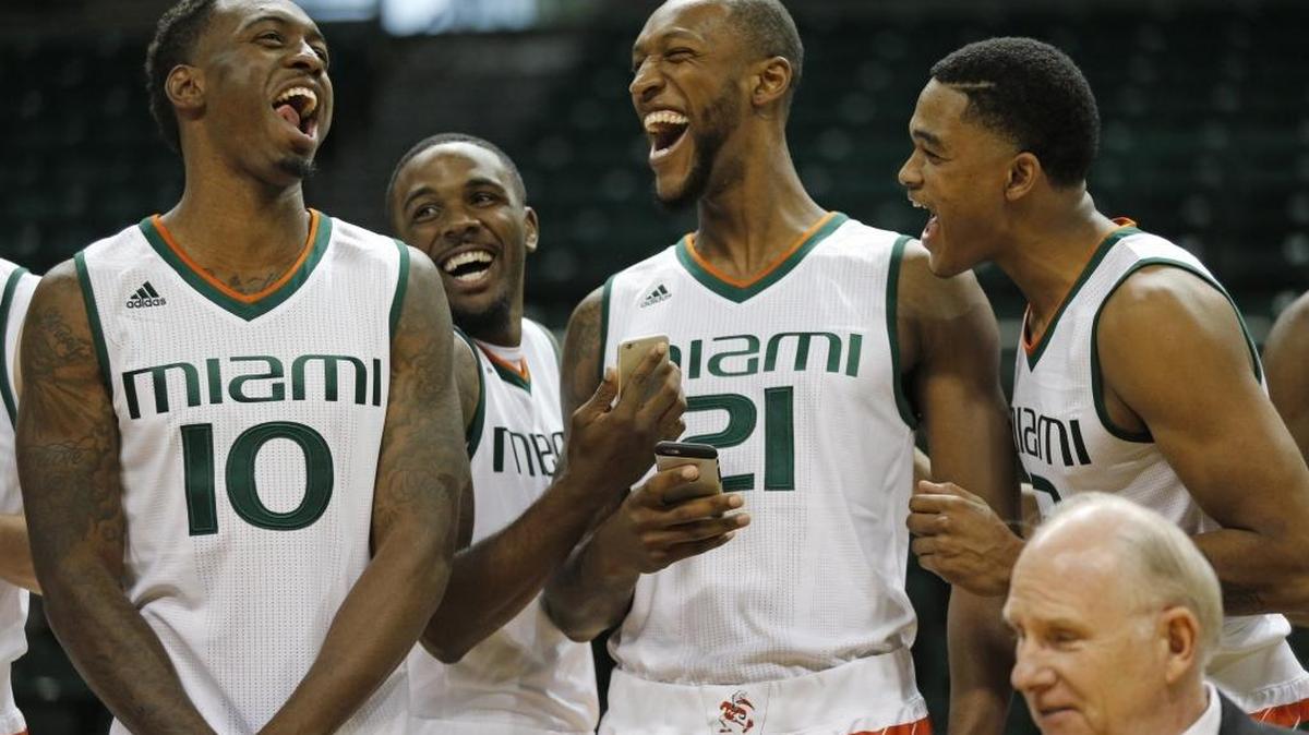 Sheldon McClellan, left, Ja'Quan Newton, Kamari Murphy and James Palmer share a laugh during UM basketball media day at BankUnited Center on Tuesday, Oct. 13, 2015.