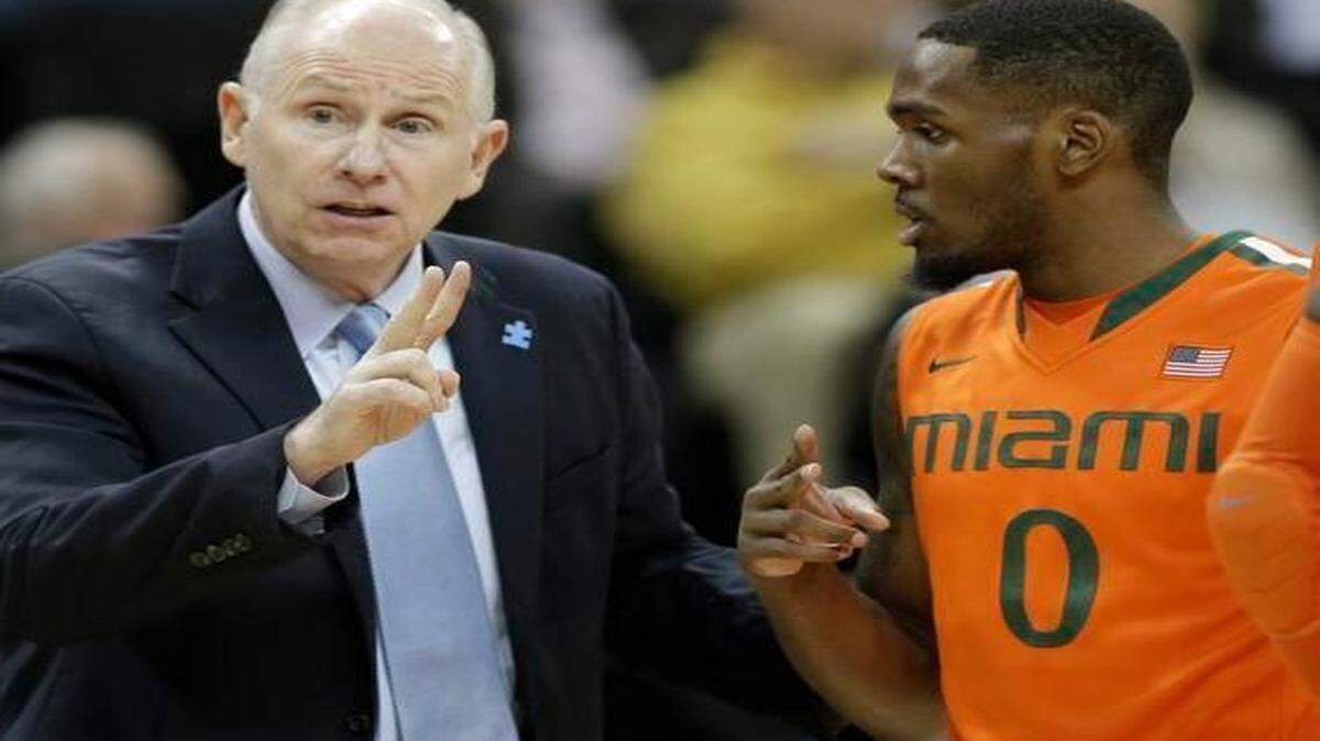 
UM coach Jim Larrañaga, talking with Ja’Quan Newton during a game at Wake Forest on Feb. 11, 2015, says of the Canes’ NCAA Tournament chances: “We’re very much in the hunt.” 
