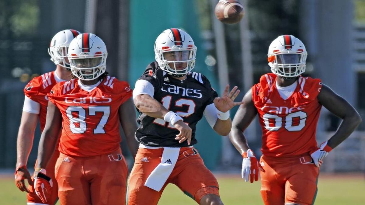 Quarterback Malik Rosier passes during drills at the University of Miami spring training practice on Tues., March 21, 2017.